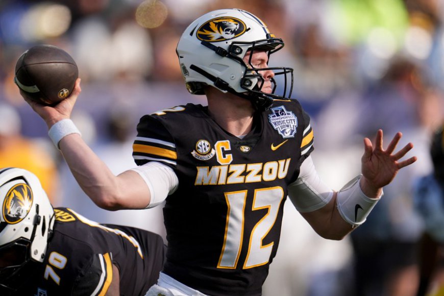 No. 23 Missouri rallies from 10 down, beats Iowa 27-24 in the Music City Bowl